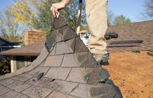 Oakland Roofing Contractor Evaluating Residential Roof for Repair