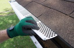 Installing Gutter Guards at Residential Property